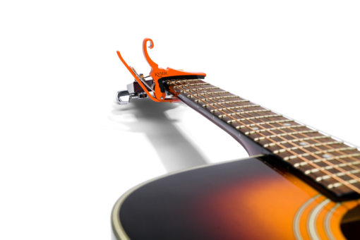 Kyser® Quick-Change® for 6 String Acoustic Guitars Orange On Guitar